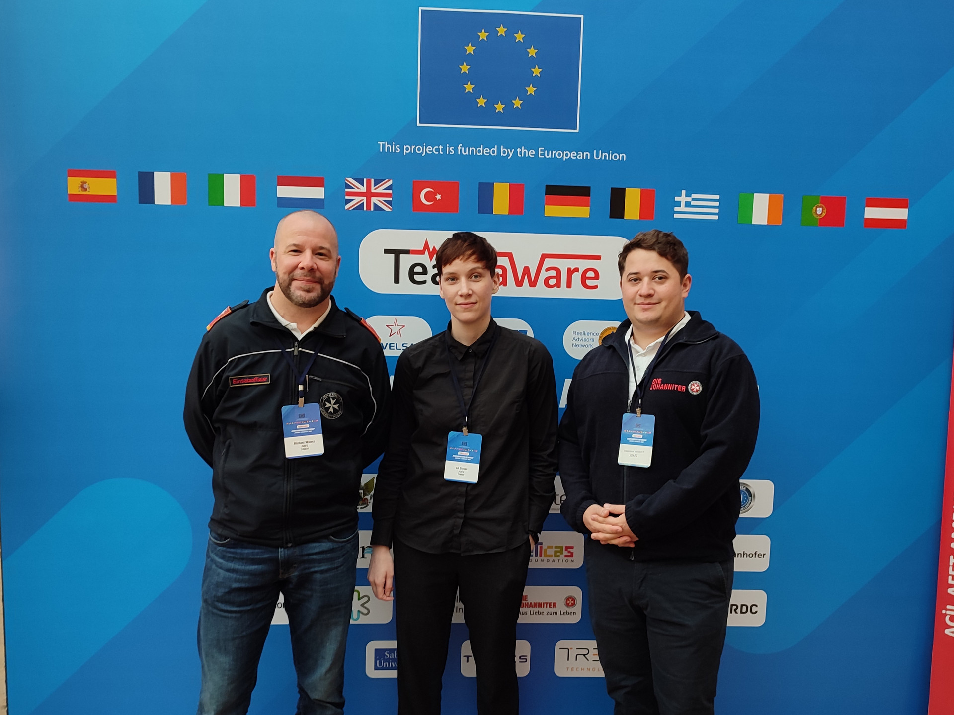 Drei Personen aus der Forschungsgruppe bei einem Workshop